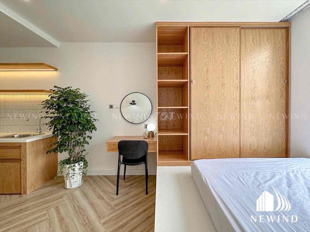 A cool studio apartment, 100 percent fresh in the third quarter, full of furniture.