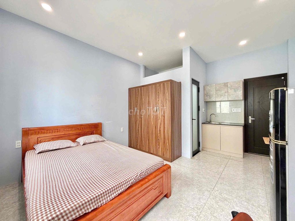 The 28-foot studio full of balconies can be located right here on the road.