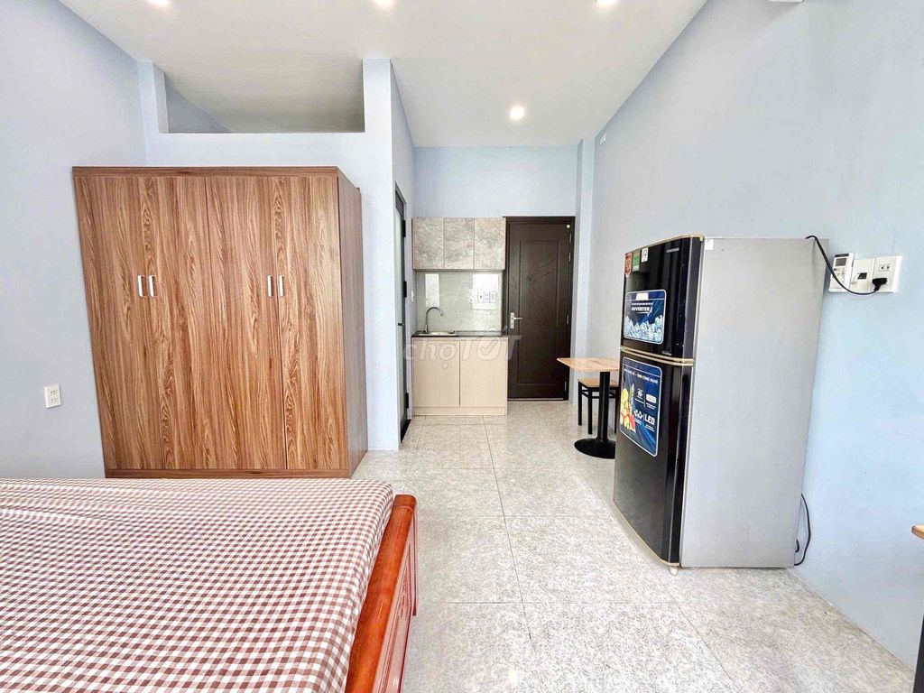 The 28-foot studio full of balconies can be located right here on the road.