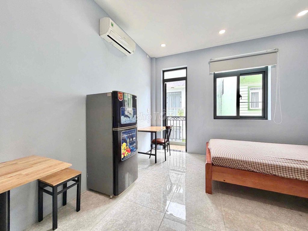 The 28-foot studio full of balconies can be located right here on the road.