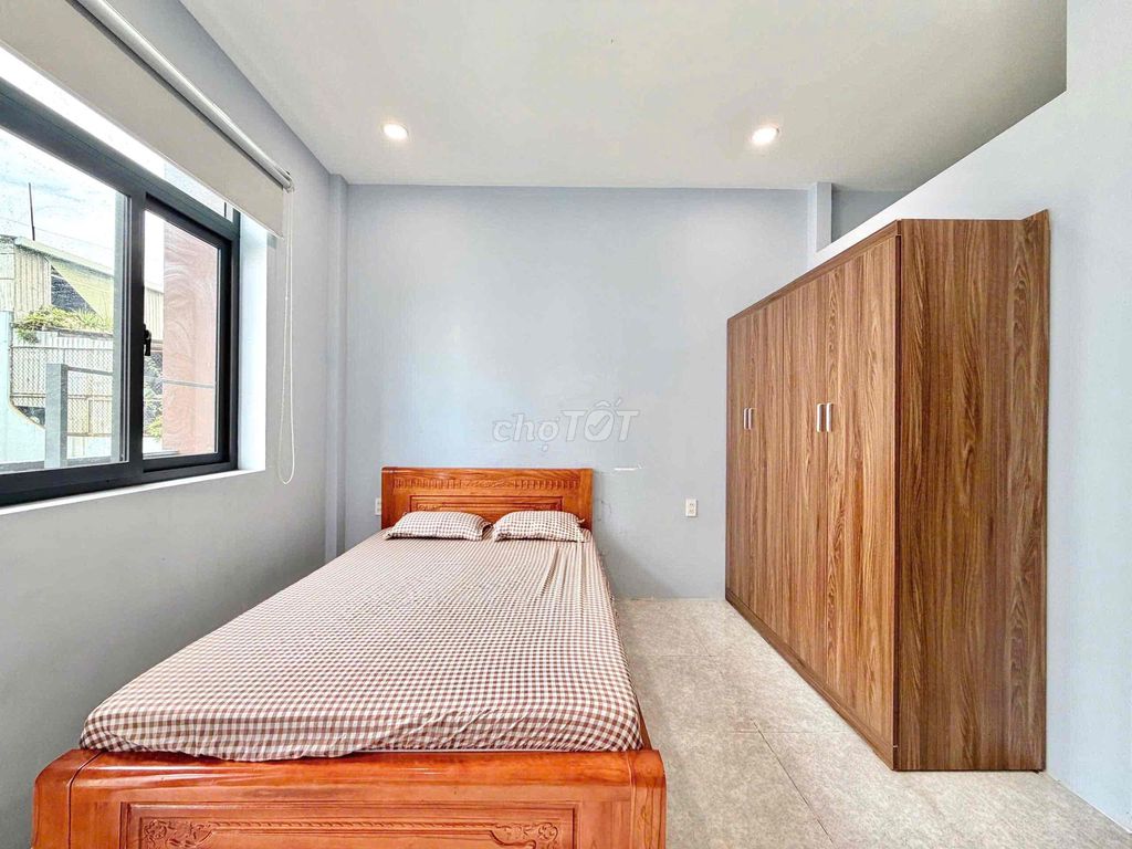 The 28-foot studio full of balconies can be located right here on the road.