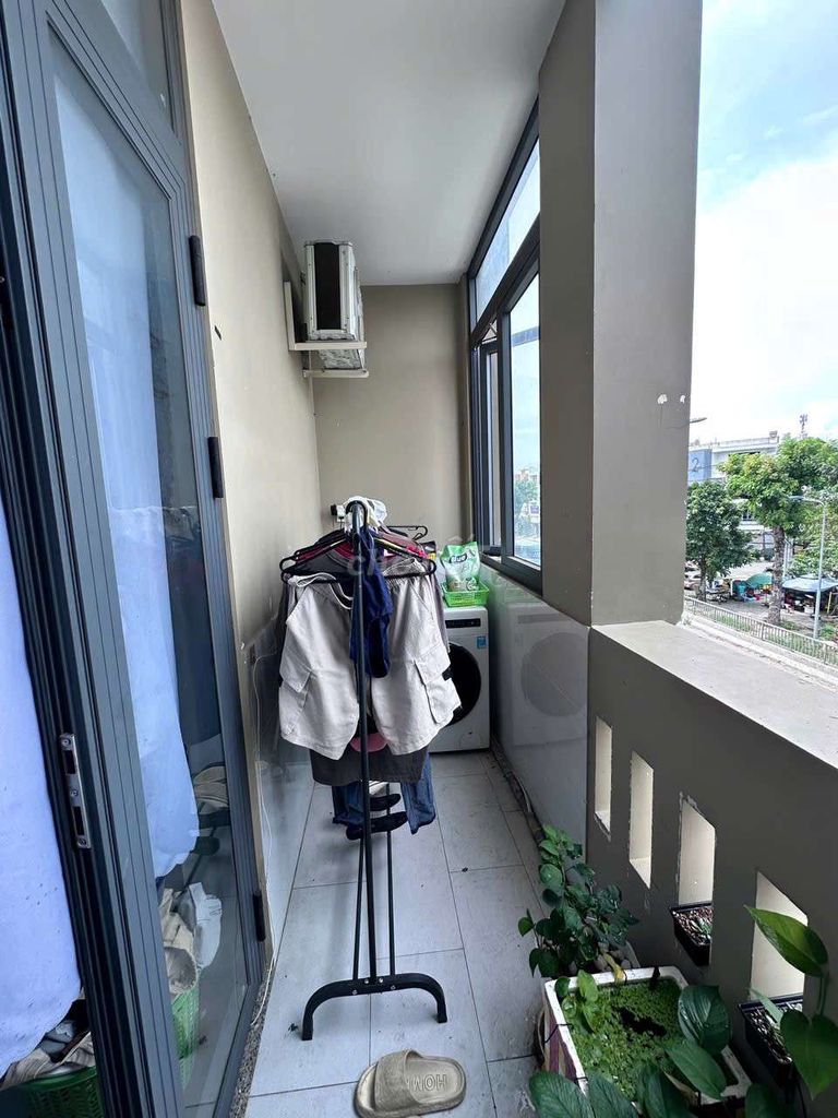 front balcony on Phạm Hữu Lầu.