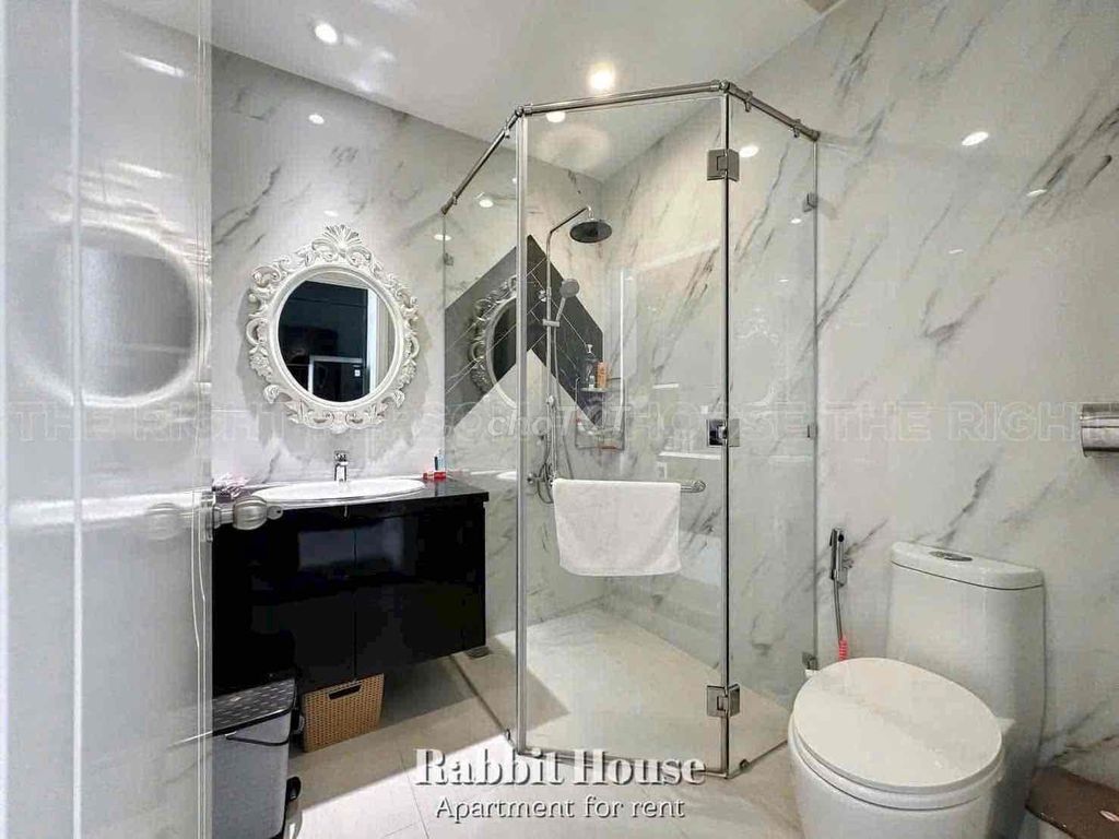 The two bedrooms are full of furniture near Tan Son Nhut Airport.