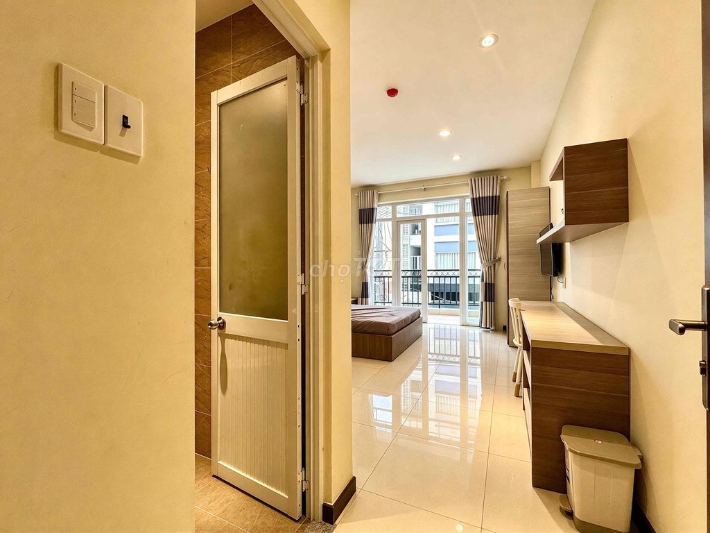 The mini-size building near the bridge has a rented room.