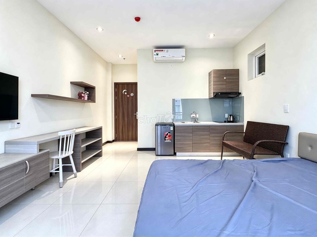 The mini-size building near the bridge has a rented room.