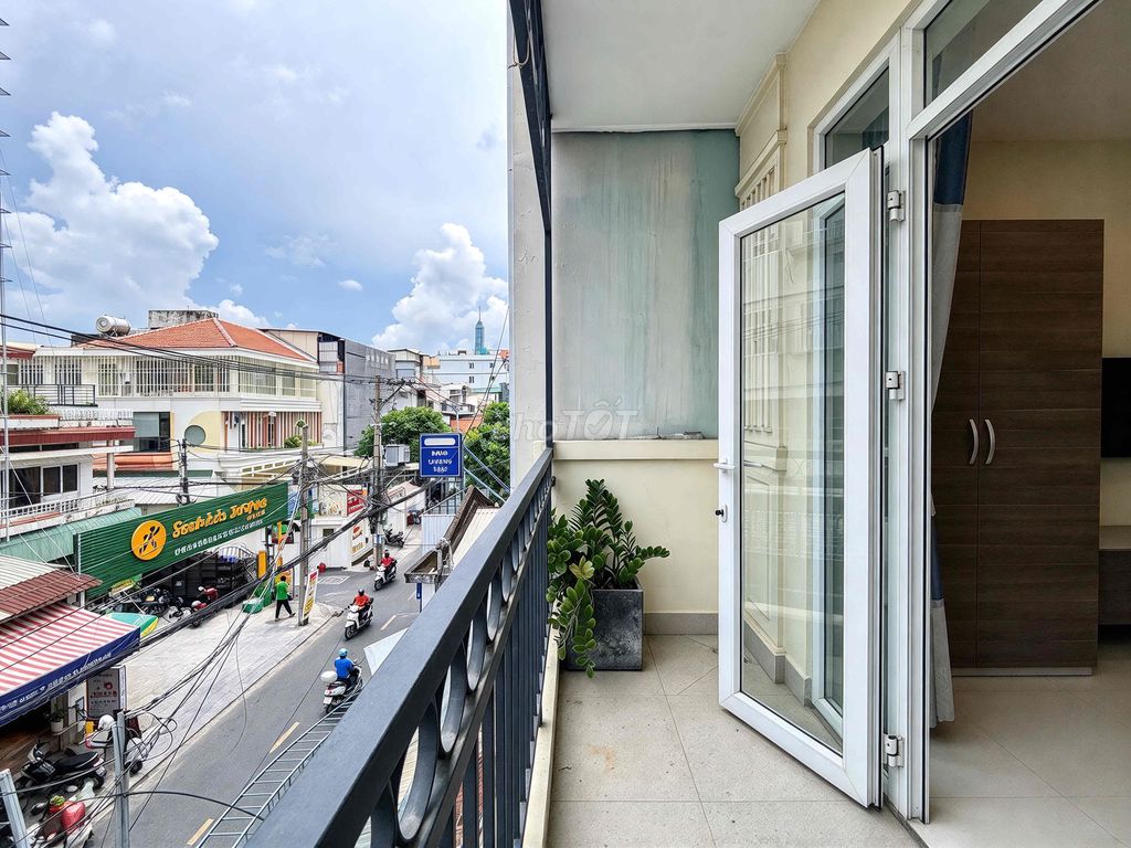 The mini-size building near the bridge has a rented room.