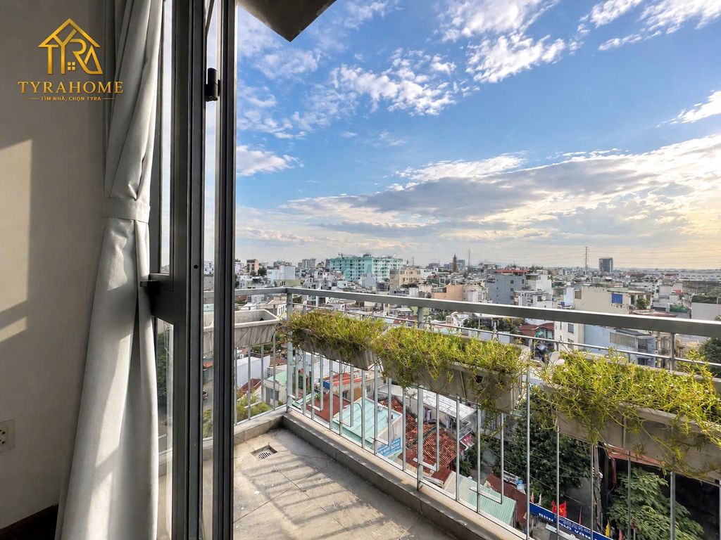 A super estate suite. A bedroom-- a balcony -- separate kitchen -- right into the page.