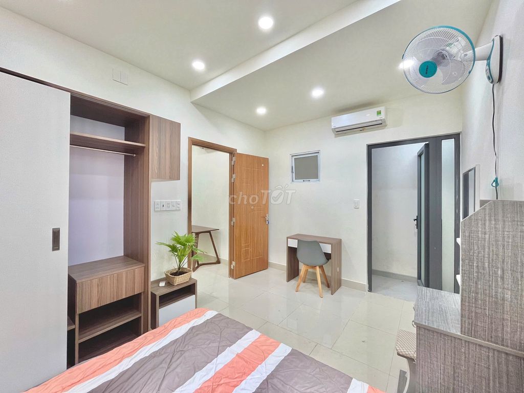 Room 1 Bạch Đằng Tân Bình, large living room, full interior.