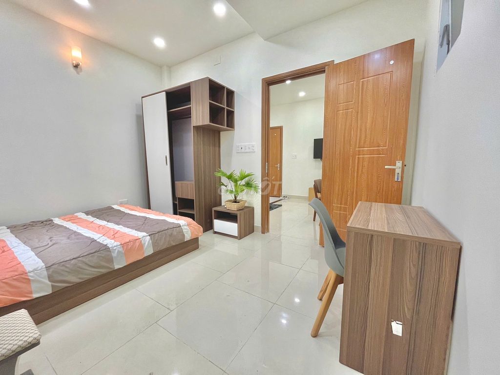 Room 1 Bạch Đằng Tân Bình, large living room, full interior.