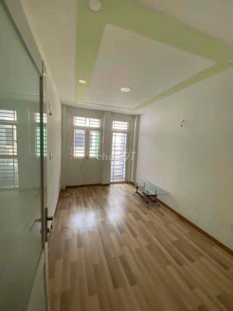 Three-by-four city residences. 3th Street.