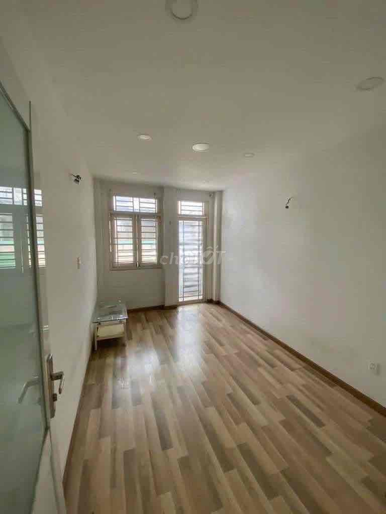 Three-by-four city residences. 3th Street.