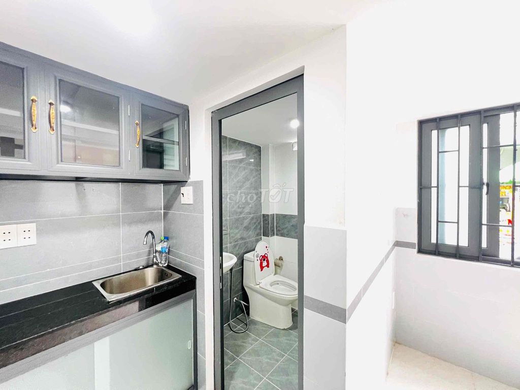 The wide kiot is in the shower dress - Trần Quan Quá