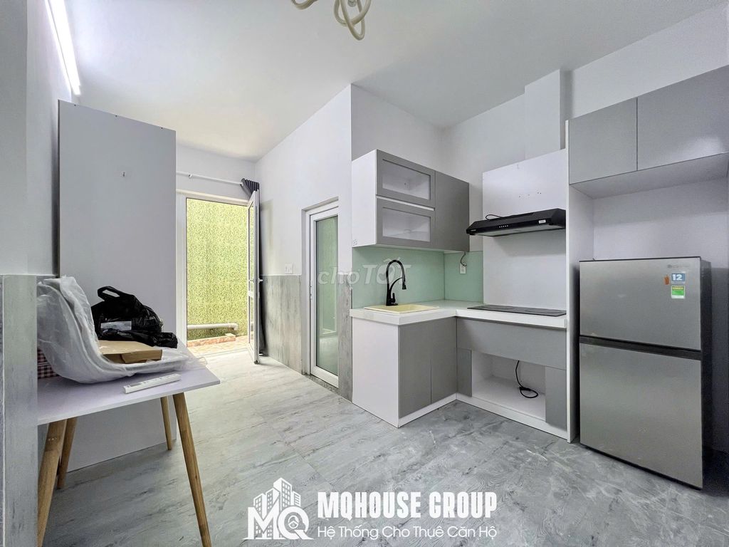A mini apartment. A good garden bedroom. A broad kitchen near the house-at-the-air.
