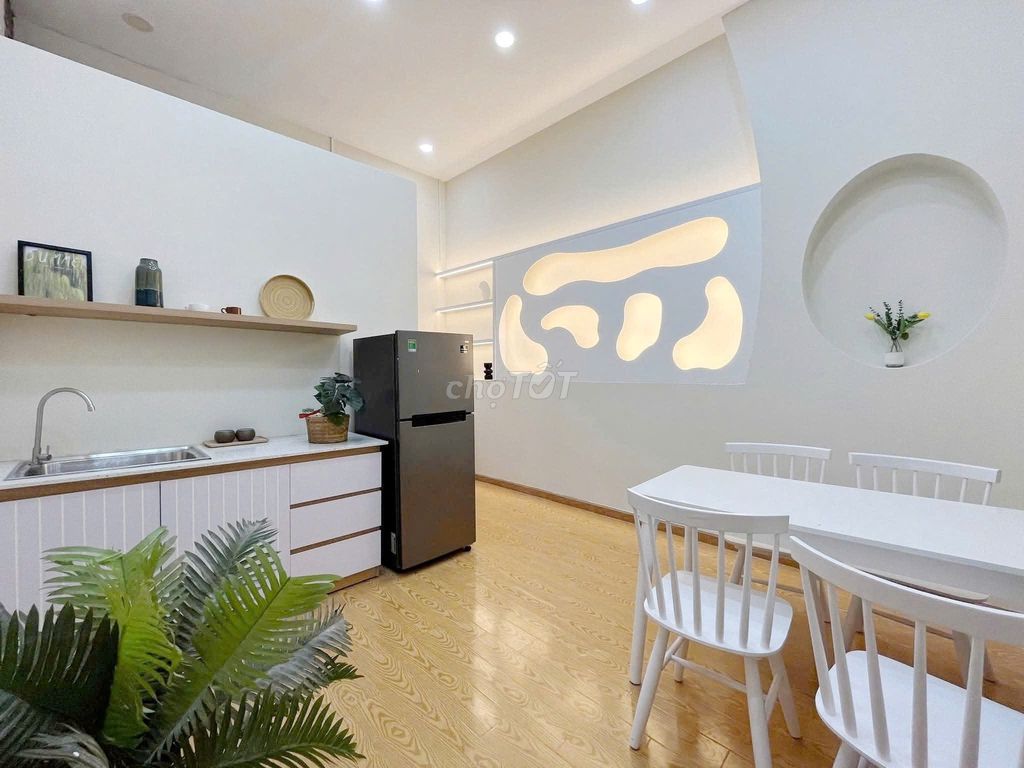Two bedrooms. One living room. A private washing machine. A window.