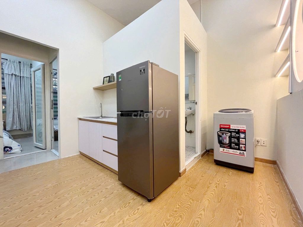 Two bedrooms. One living room. A private washing machine. A window.