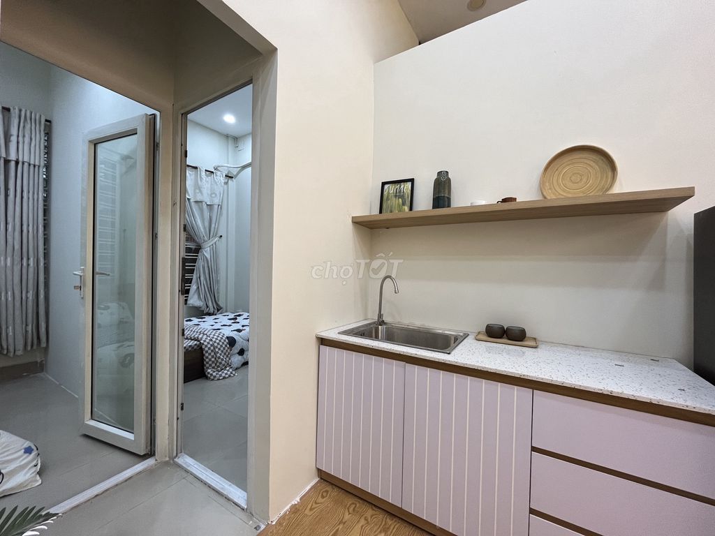 Two bedrooms. One living room. A private washing machine. A window.