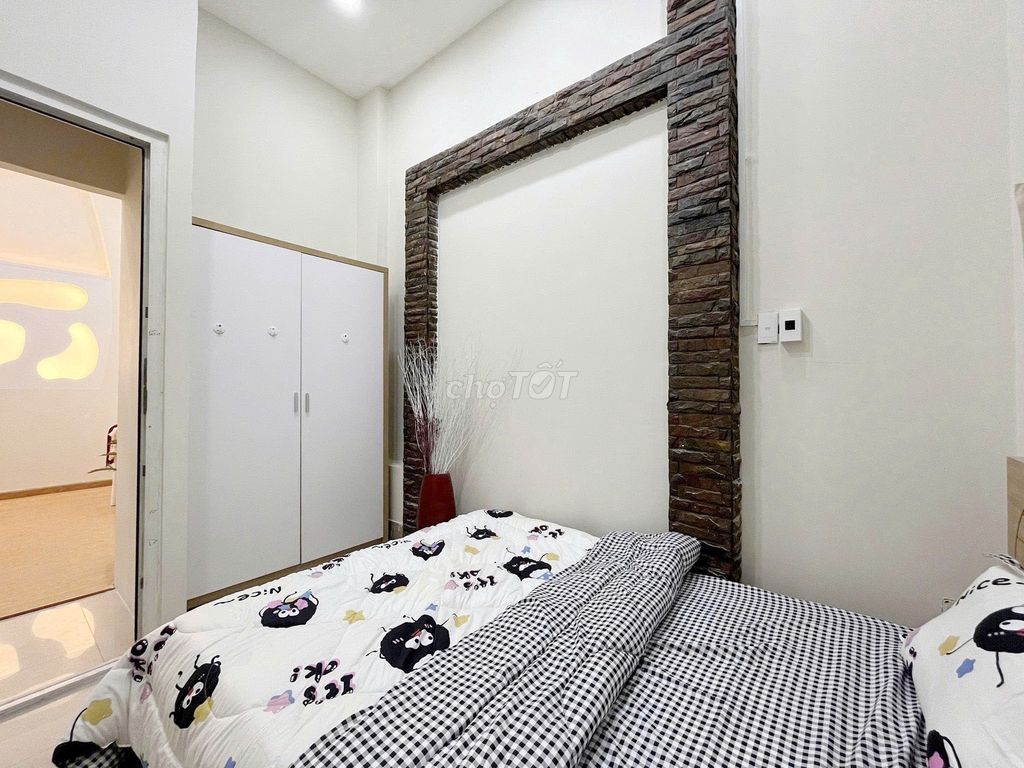 Two bedrooms. One living room. A private washing machine. A window.