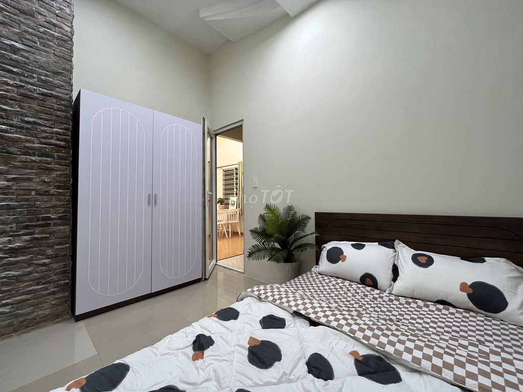 Two bedrooms. One living room. A private washing machine. A window.