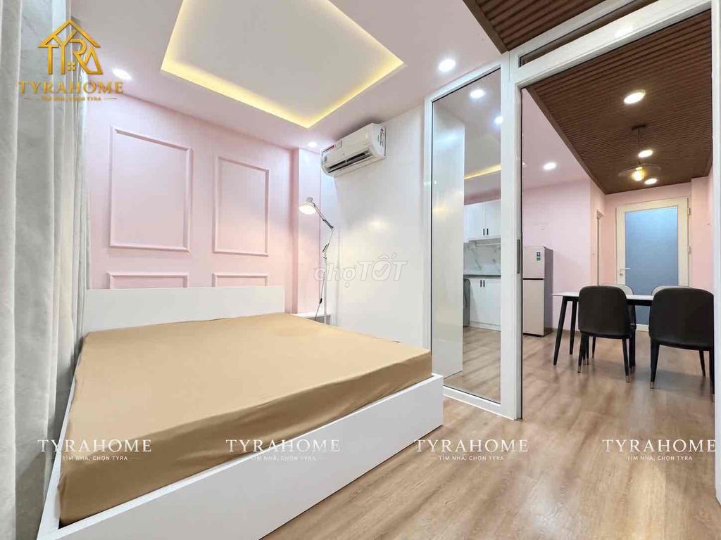 A hyper-max. A bedroom. A balcony.