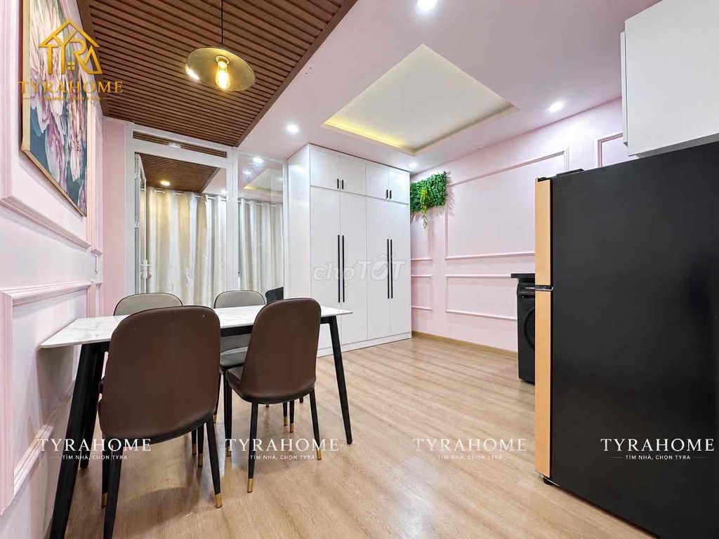 A hyper-max. A bedroom. A balcony.
