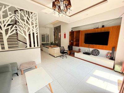 Four floors full of high-end furniture, like in District 7-indentation.
