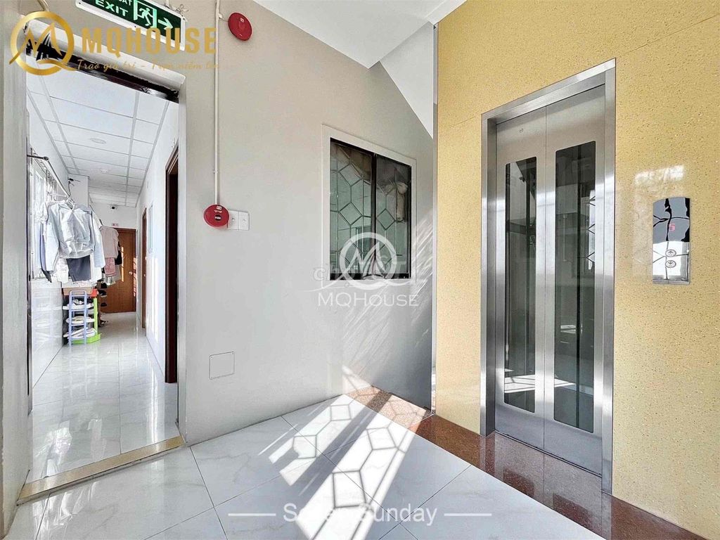 The apartment is full of furniture, garages, elevators, utility area at bt