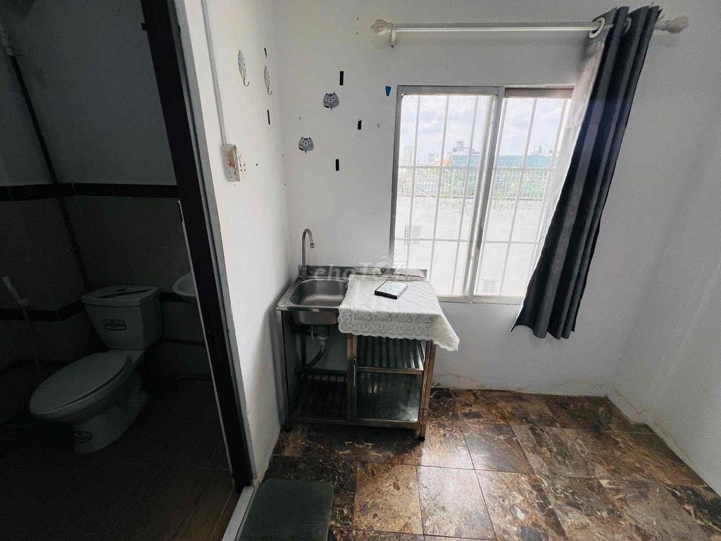 The window room has a mattress across from the west stop.