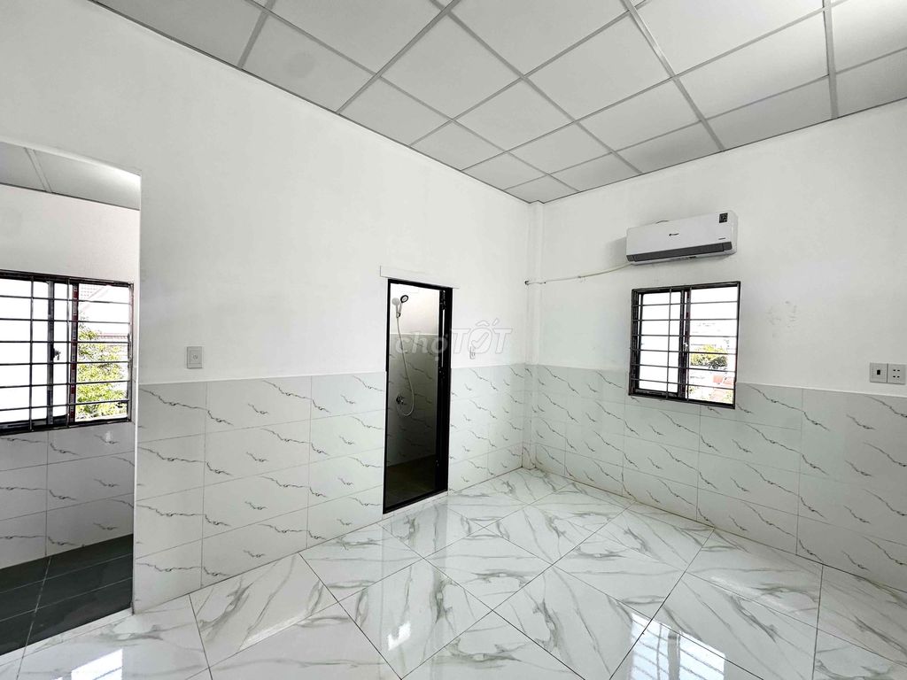 The new room -- extreme student - ready air conditioning - open window