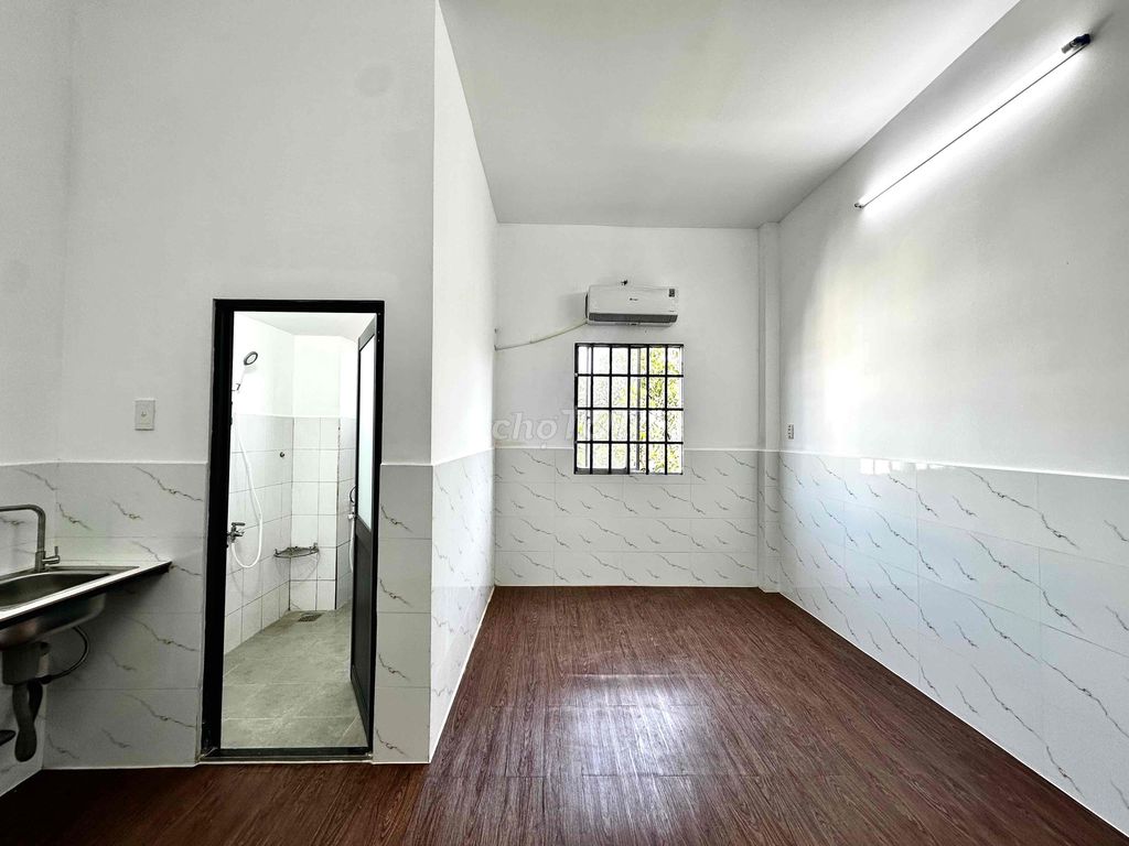 The new room -- extreme student - ready air conditioning - open window