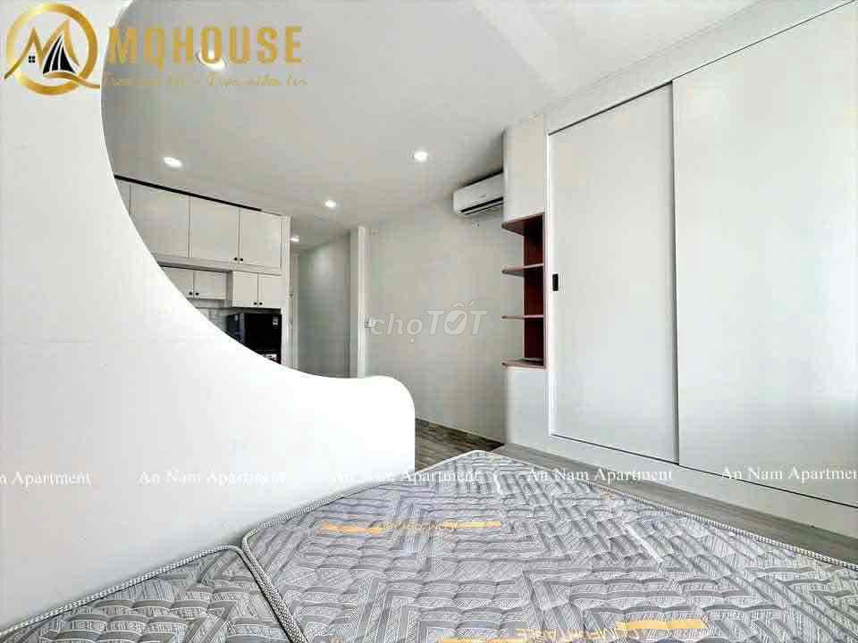 A hyper-max. A bedroom. A balcony.