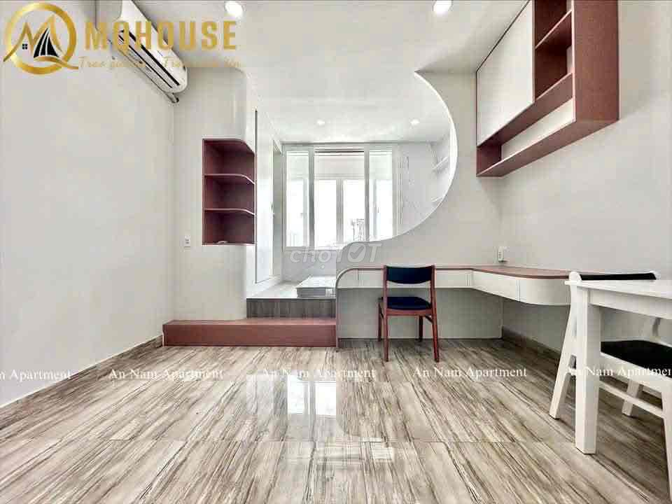 A hyper-max. A bedroom. A balcony.