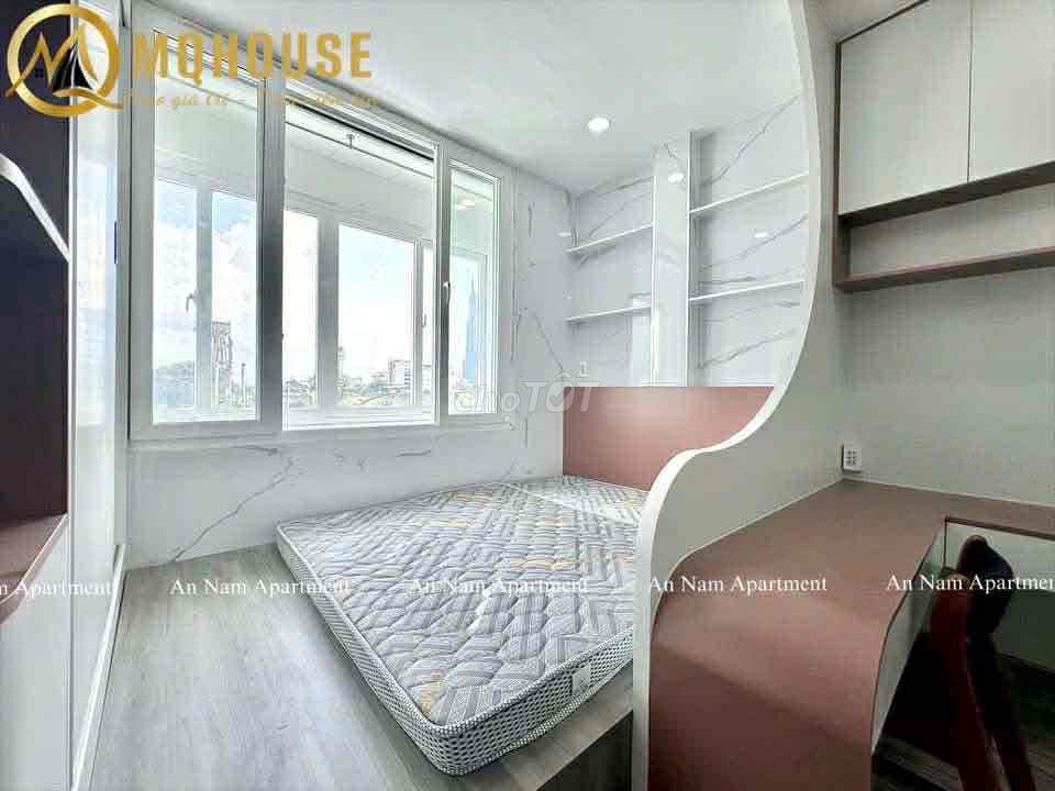 A hyper-max. A bedroom. A balcony.