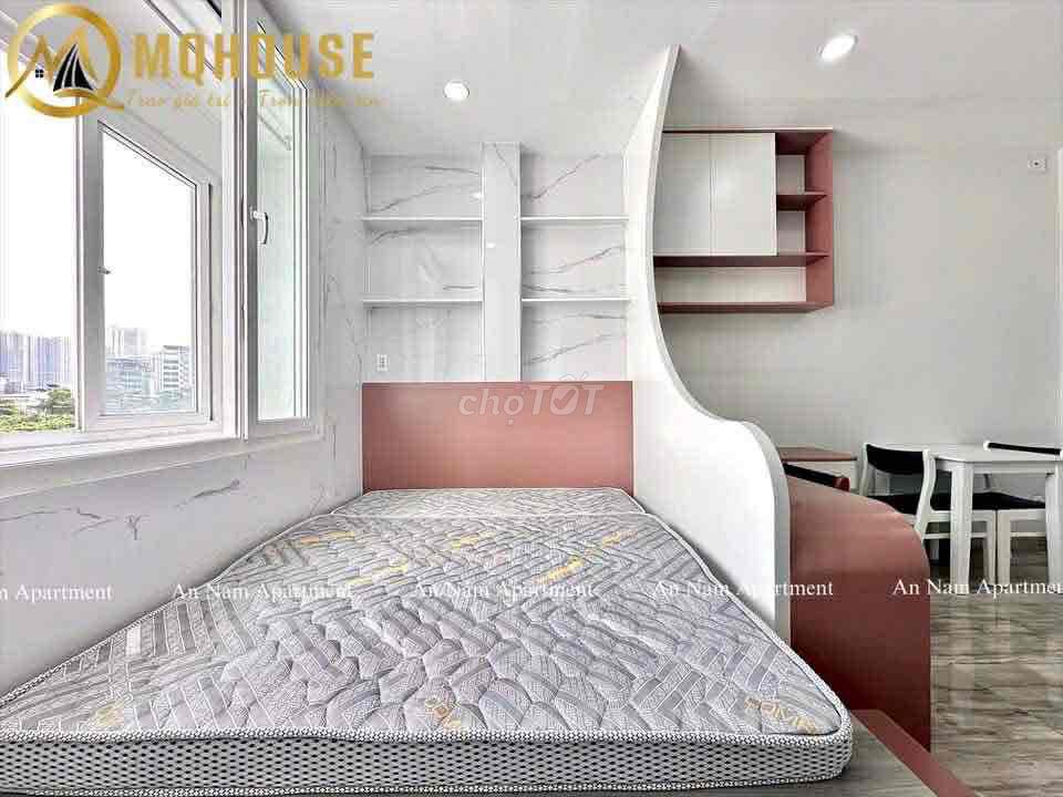 A hyper-max. A bedroom. A balcony.