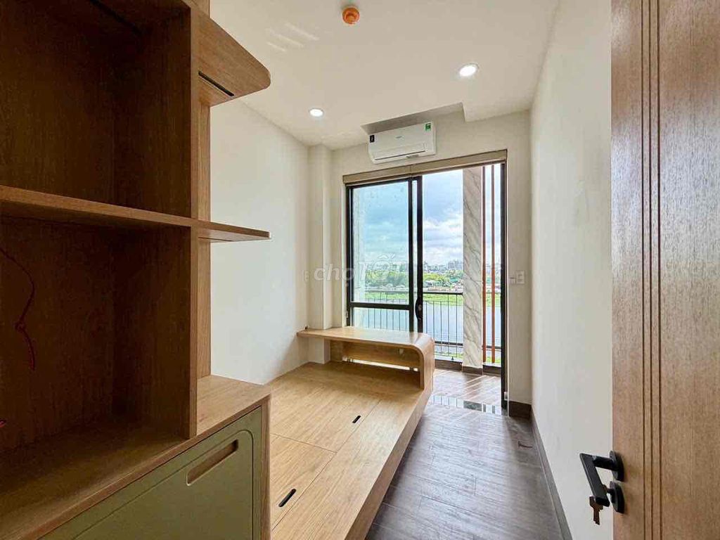 The two bedrooms saw the river river the new interior built 100% right here in Thống Nhất.