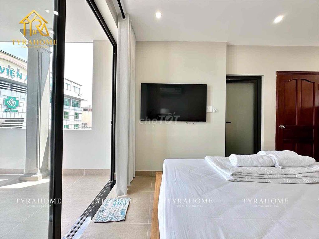 A super-beautiful apartment-- big balconies-- cut the kitchen out in the ceiling.