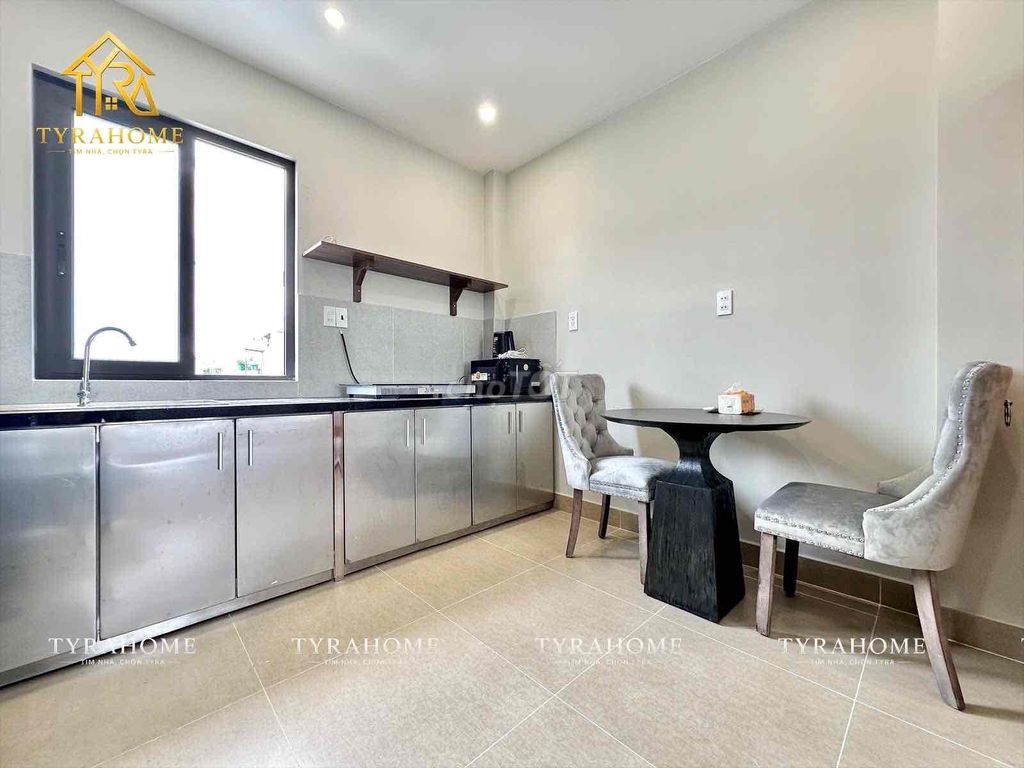 A super-beautiful apartment-- big balconies-- cut the kitchen out in the ceiling.