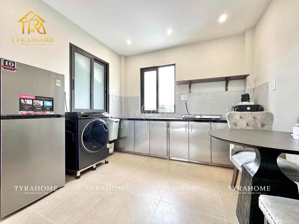 A super-beautiful apartment-- big balconies-- cut the kitchen out in the ceiling.