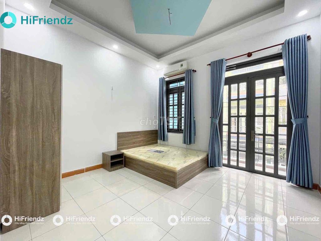 Open the apartment. A balcony bedroom.