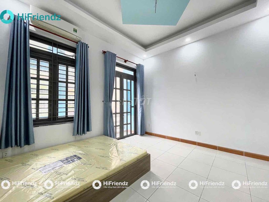 Open the apartment. A balcony bedroom.