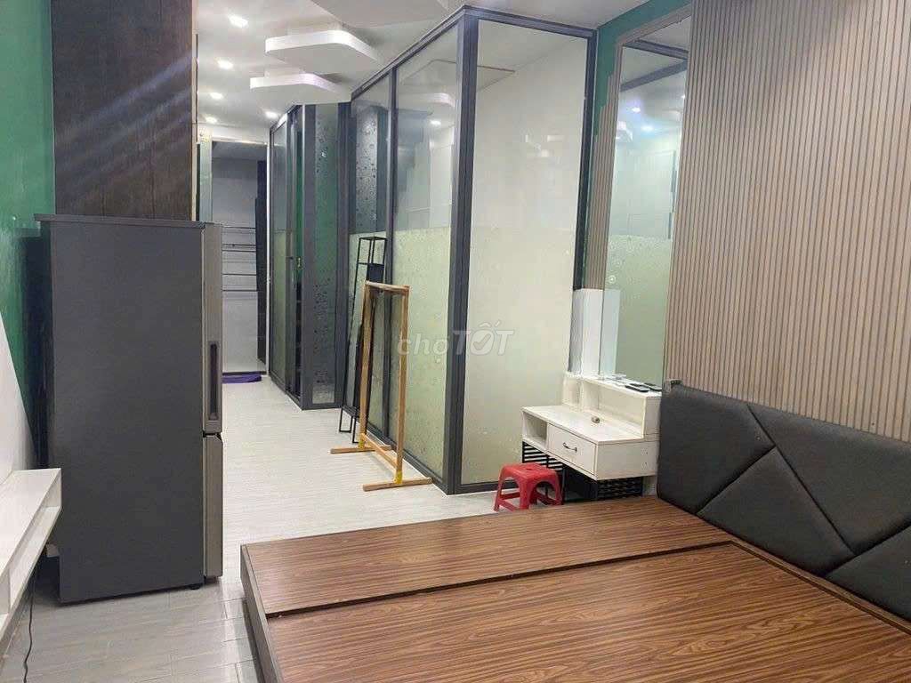two rooms full of furniture.