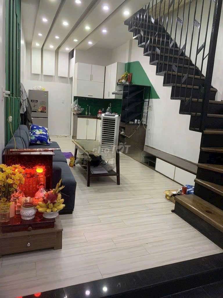 two rooms full of furniture.