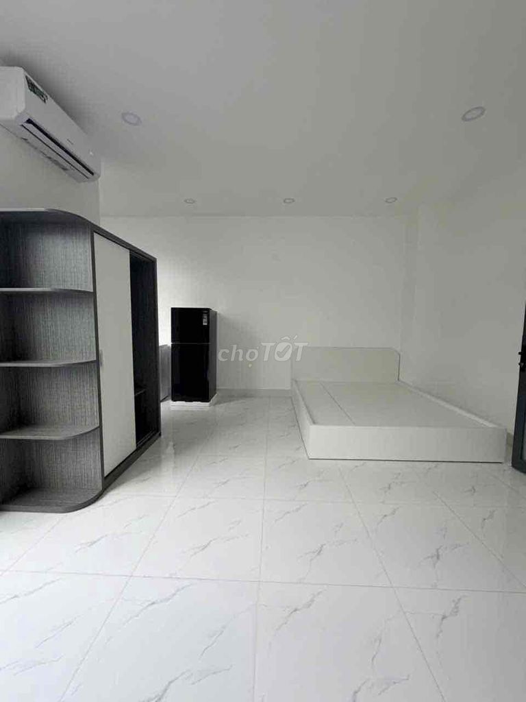 The new studio is full of furniture - cheap at the University of Charitable College.