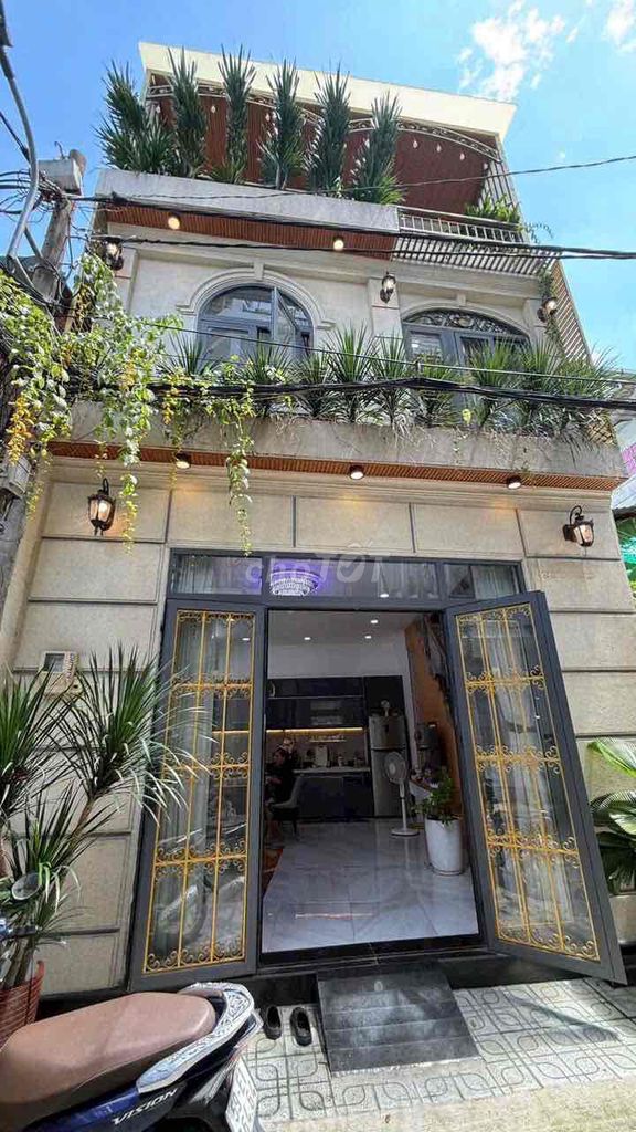 The new full interior is 40 meters 2 floors 3 bedroom 3 st Quang Trung toilet