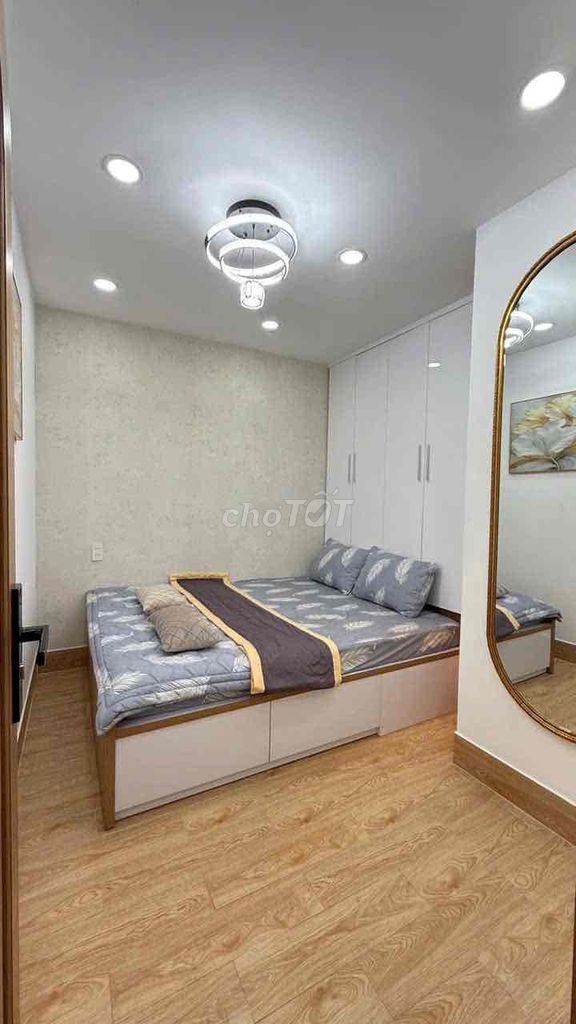 The new full interior is 40 meters 2 floors 3 bedroom 3 st Quang Trung toilet