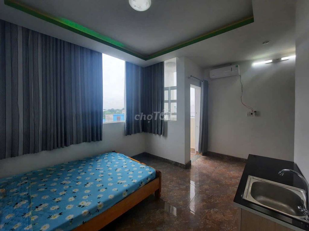 A low-cost hotel room. Full interior. Hiệp Thành with a balcony.