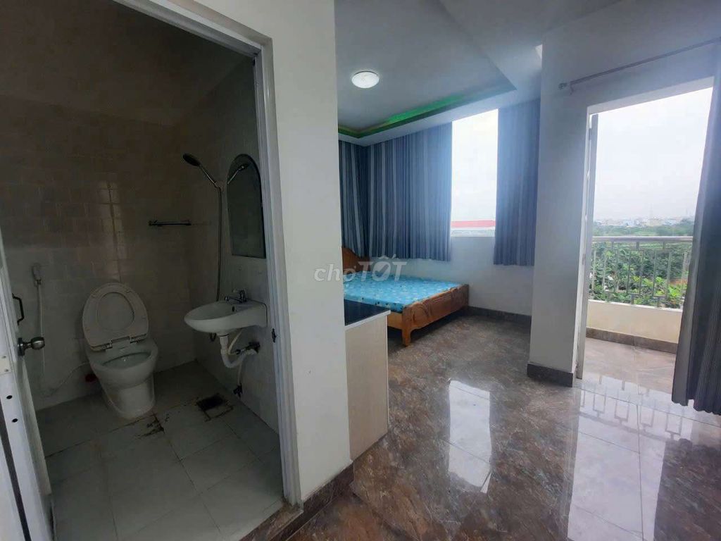 A low-cost hotel room. Full interior. Hiệp Thành with a balcony.