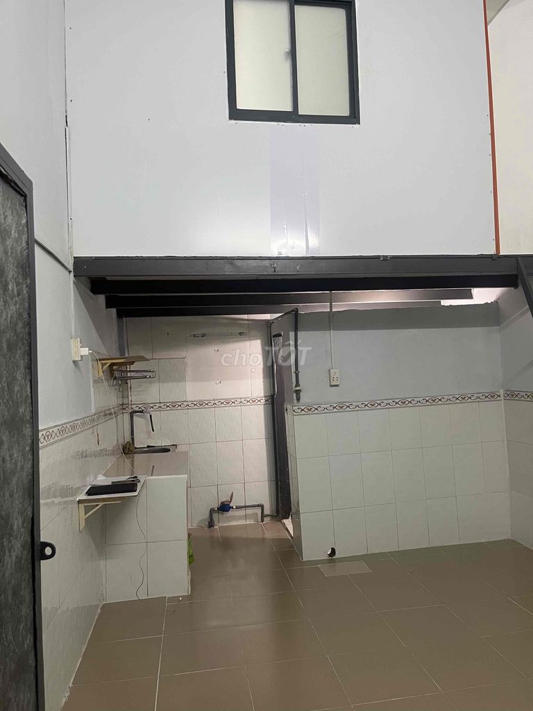 A cheap hotel room with fingerprints, air conditioning, private rooms.