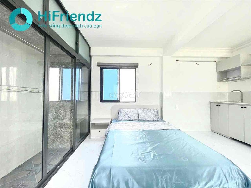 mini apartment's right on Phan Xích Long near the center.