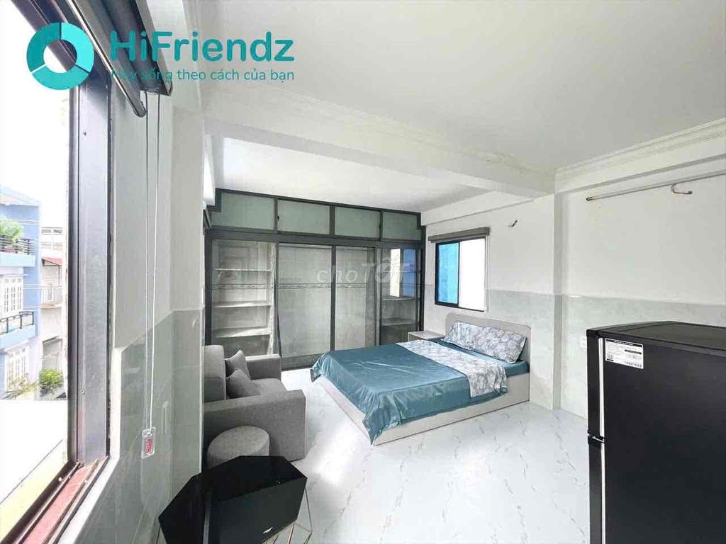 mini apartment's right on Phan Xích Long near the center.