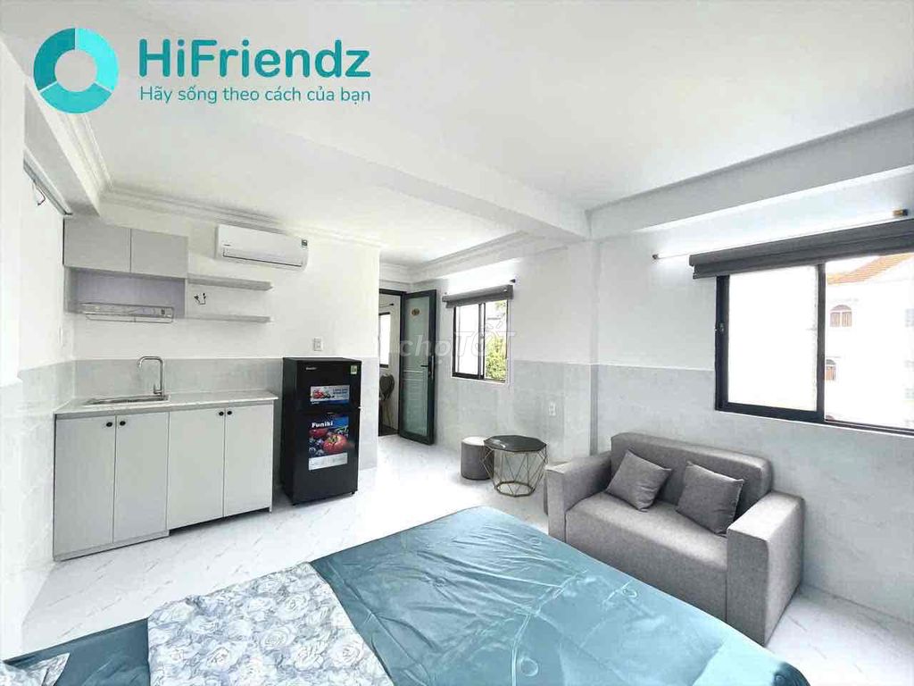 mini apartment's right on Phan Xích Long near the center.